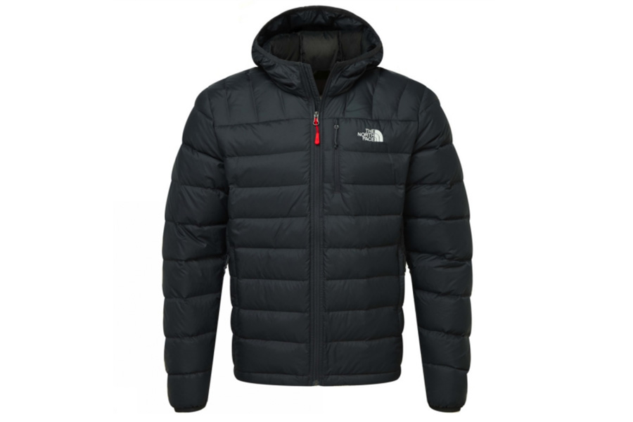 A black puffer jacket by North Face with a hood