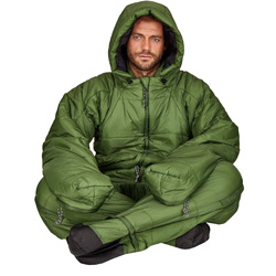 A green sleeping bag suit, being worn by a man who is sat with his legs crossed, he has the hood up.