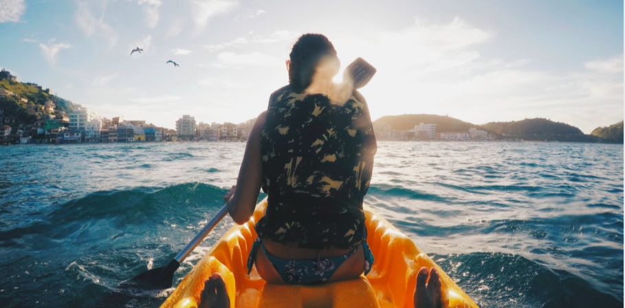 A person in a kayak on water